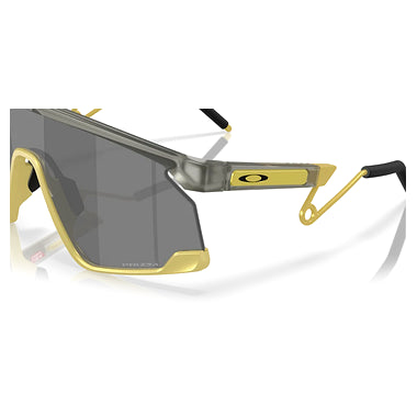 Oakley Sunglass BXTR Metal Alloy Collection prizm black Lenses With matte grey ink/vintage gold Frame