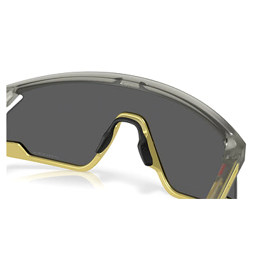Oakley Sunglass BXTR Metal Alloy Collection prizm black Lenses With matte grey ink/vintage gold Frame